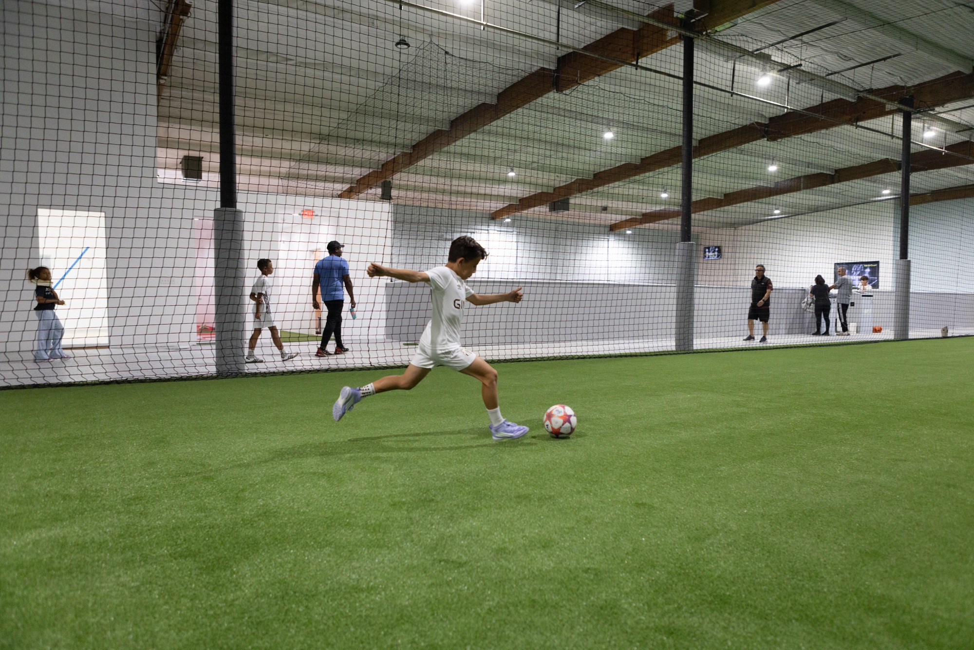 Player training inside Formula Soccer Center