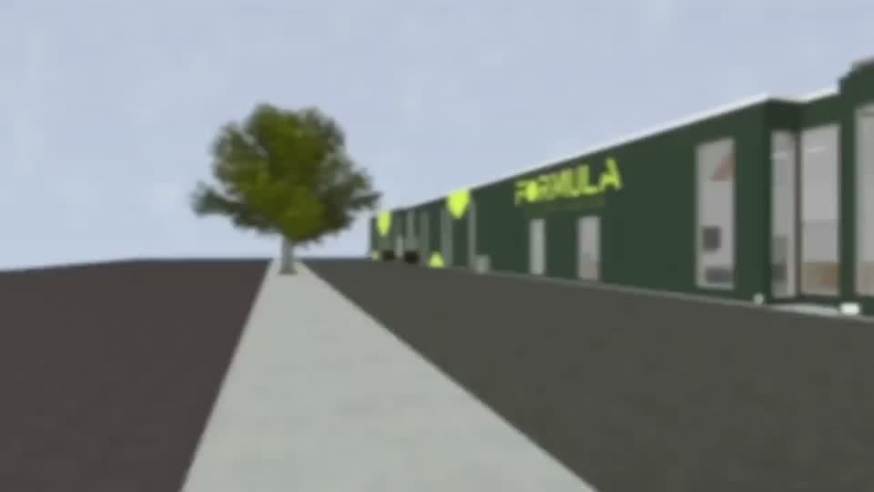 Wide view of Formula Soccer Center training floor and zones.