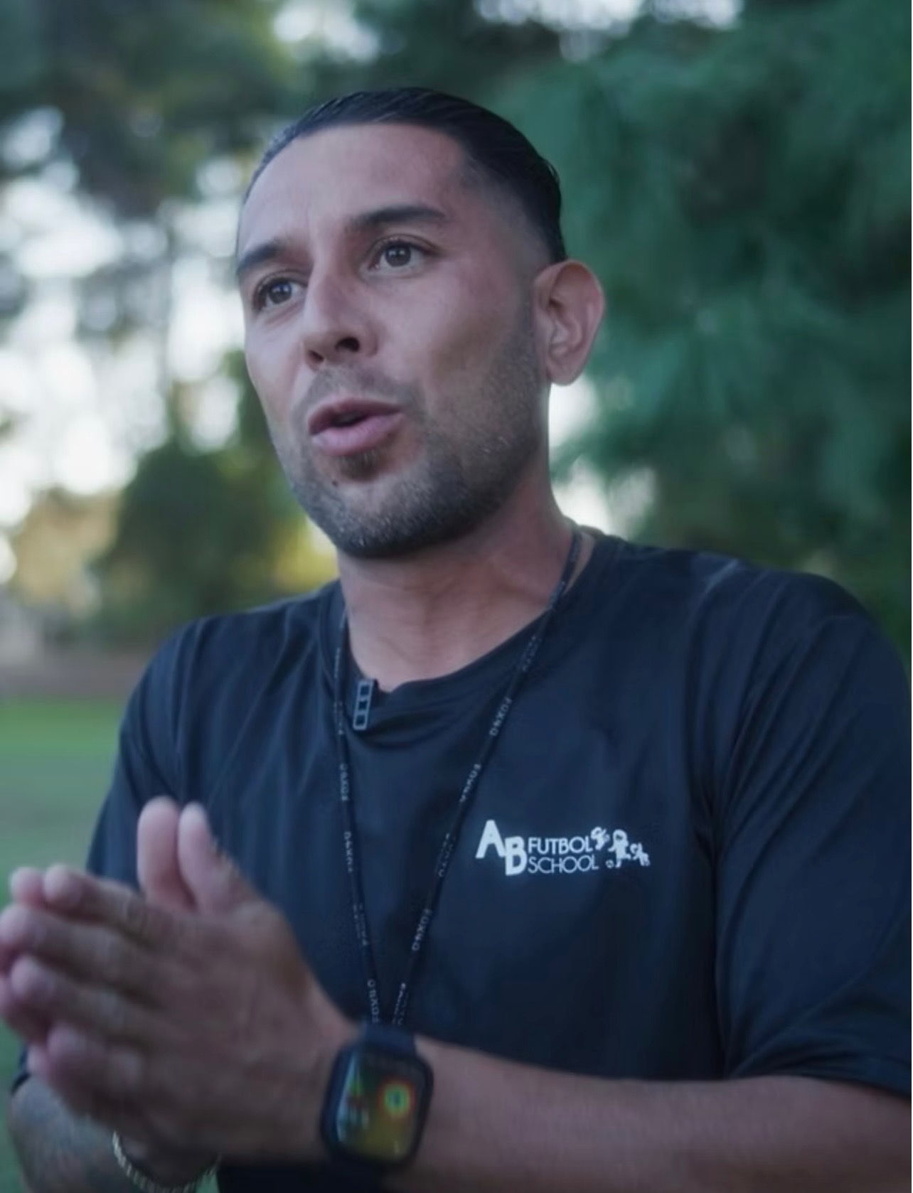 Andres Baena, Associate Coach at Formula Soccer Center, coaching on the field.